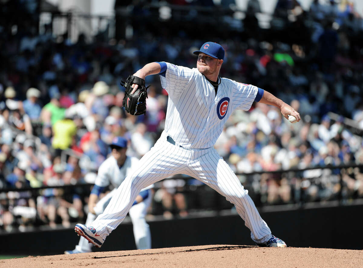 Jon Lester pitched two shutout innings with three strikeouts in a 5-2 loss to the Reds.