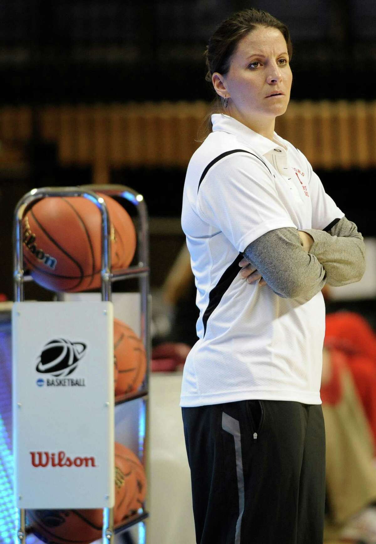 Hartford head coach Jennifer Rizzotti watches her team practice in the first round of the NCAA women's college basketball tournament Storrs, Conn., Saturday, March 19, 2011. Hartford plays Connecticut on Sunday. (AP Photo/Jessica Hill)