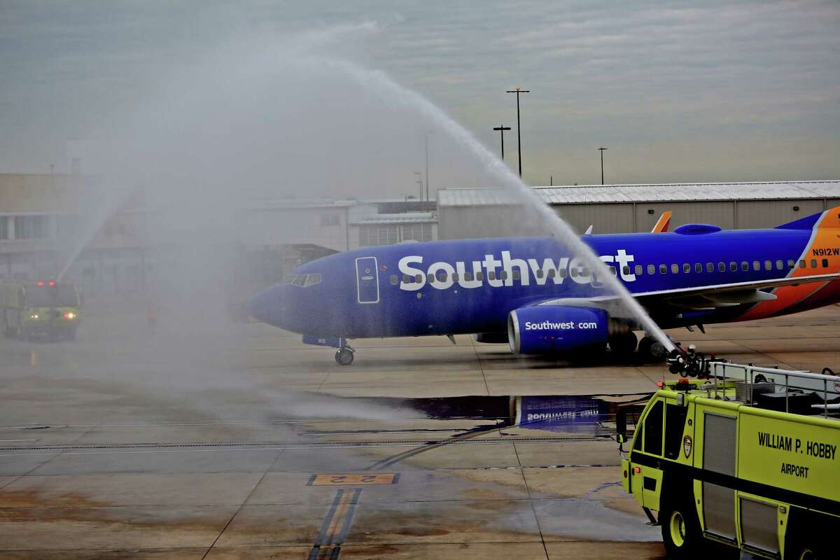 Fire trucks welcome Southwest Airlines' inaugural international flight arriving from Aruba to Houston William P. Hobby Airport Saturday, March 7, 2015, in Houston, Texas. This inaugural flight is the beginning of broader international service from Houston to destinations beyond the U.S. border. ( Gary Coronado / Houston Chronicle )