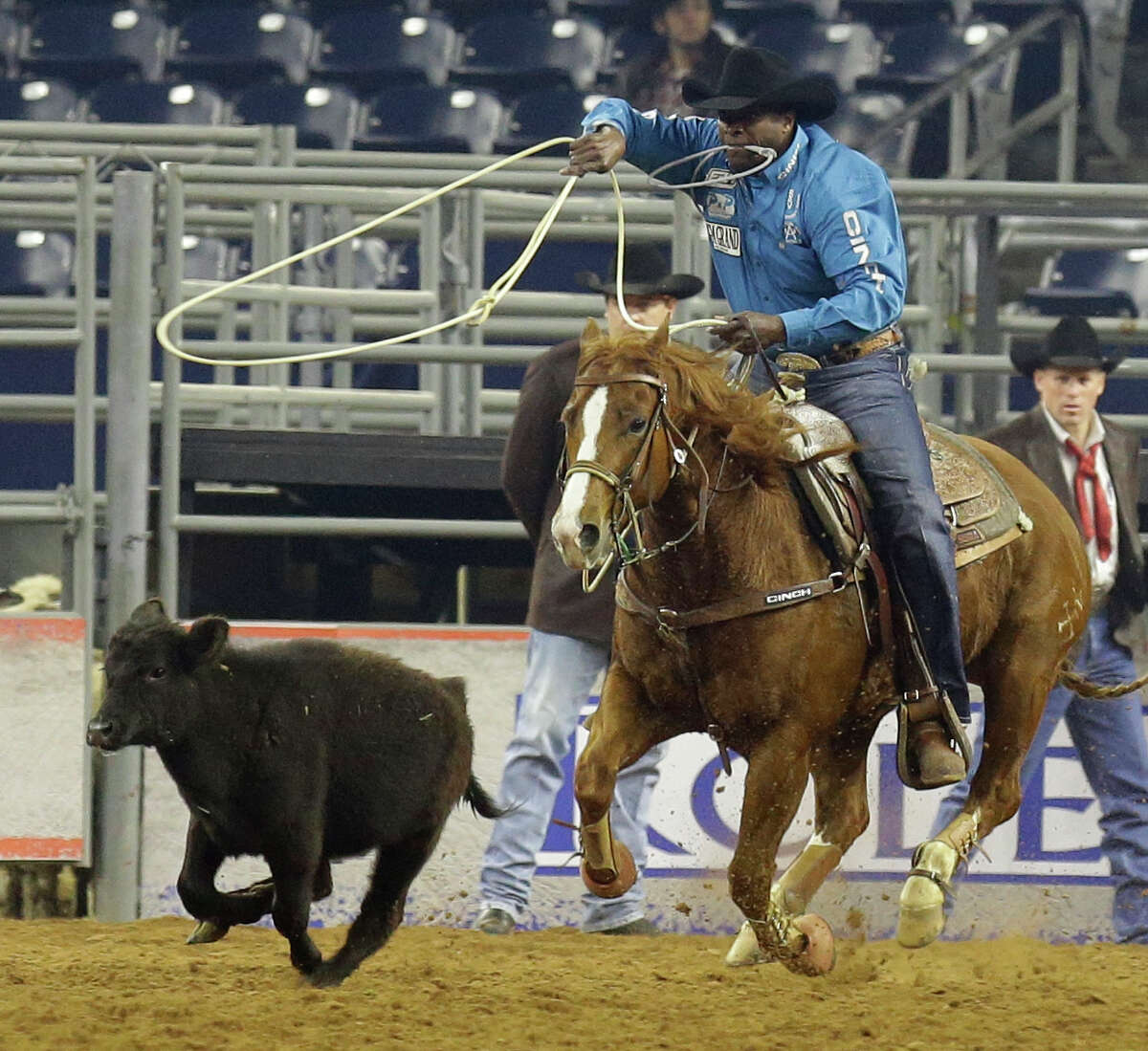Fred Whitfield of Hockley competes in the tie-down roping event during RodeoHouston at the Houston Livestock Show and Rodeo in NRG Stadium Sunday, March 8, 2015, in Houston.