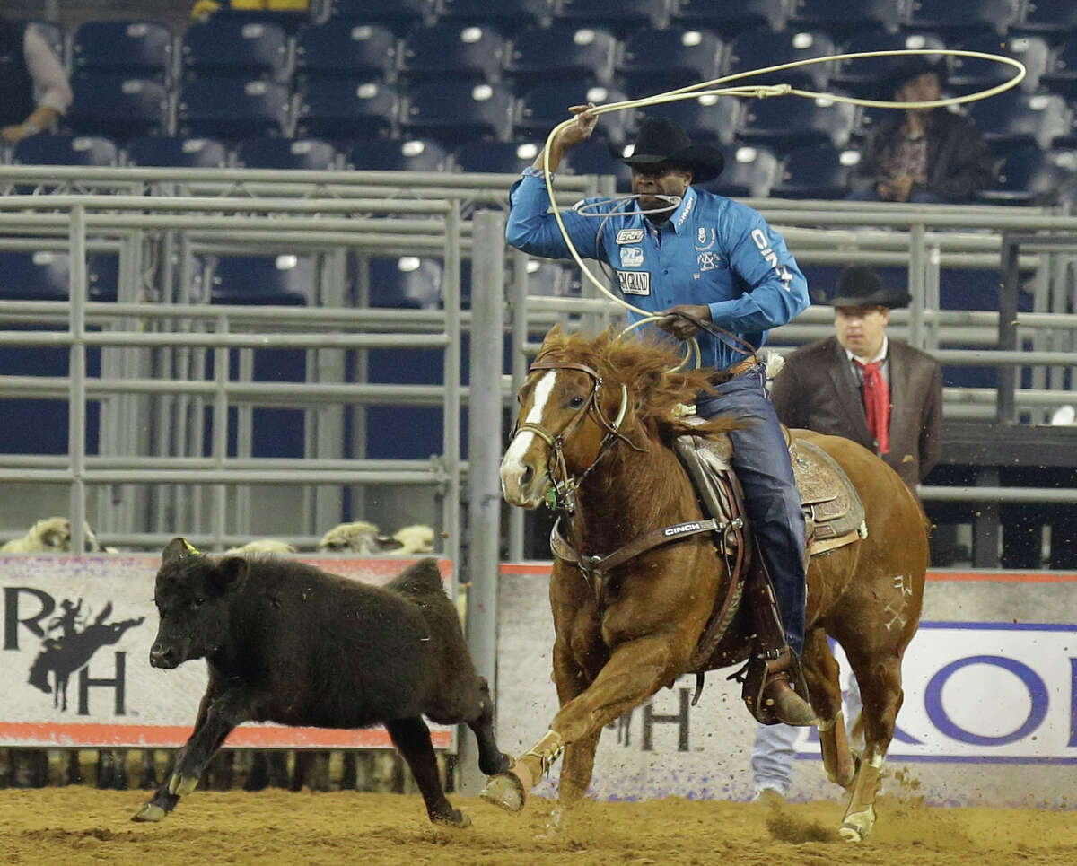 Fred Whitfield of Hockley competes in the tie-down roping event during RodeoHouston at the Houston Livestock Show and Rodeo in NRG Stadium Sunday, March 8, 2015, in Houston.