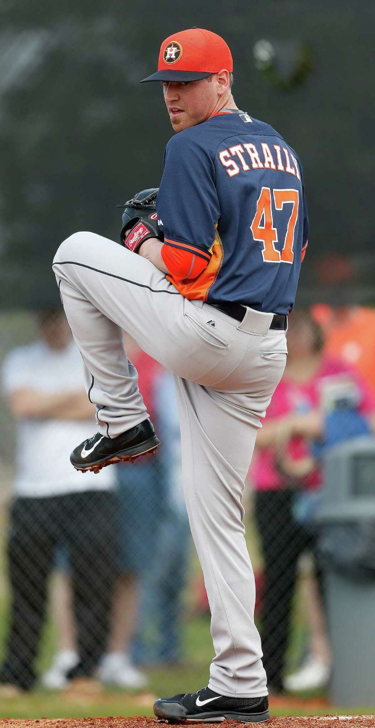Houston Astros starting pitcher Dan Straily (47) pitches during spring training workouts for pitchers and catchers at their Osceola County training facility, Monday, Feb. 23, 2015, in Kissimmee. ( Karen Warren / Houston Chronicle )