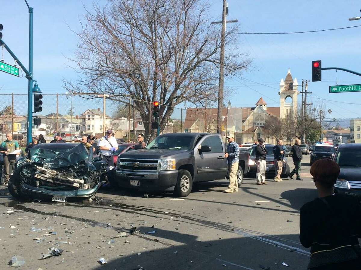 Car fleeing marshals slams into van in Oakland (photos)