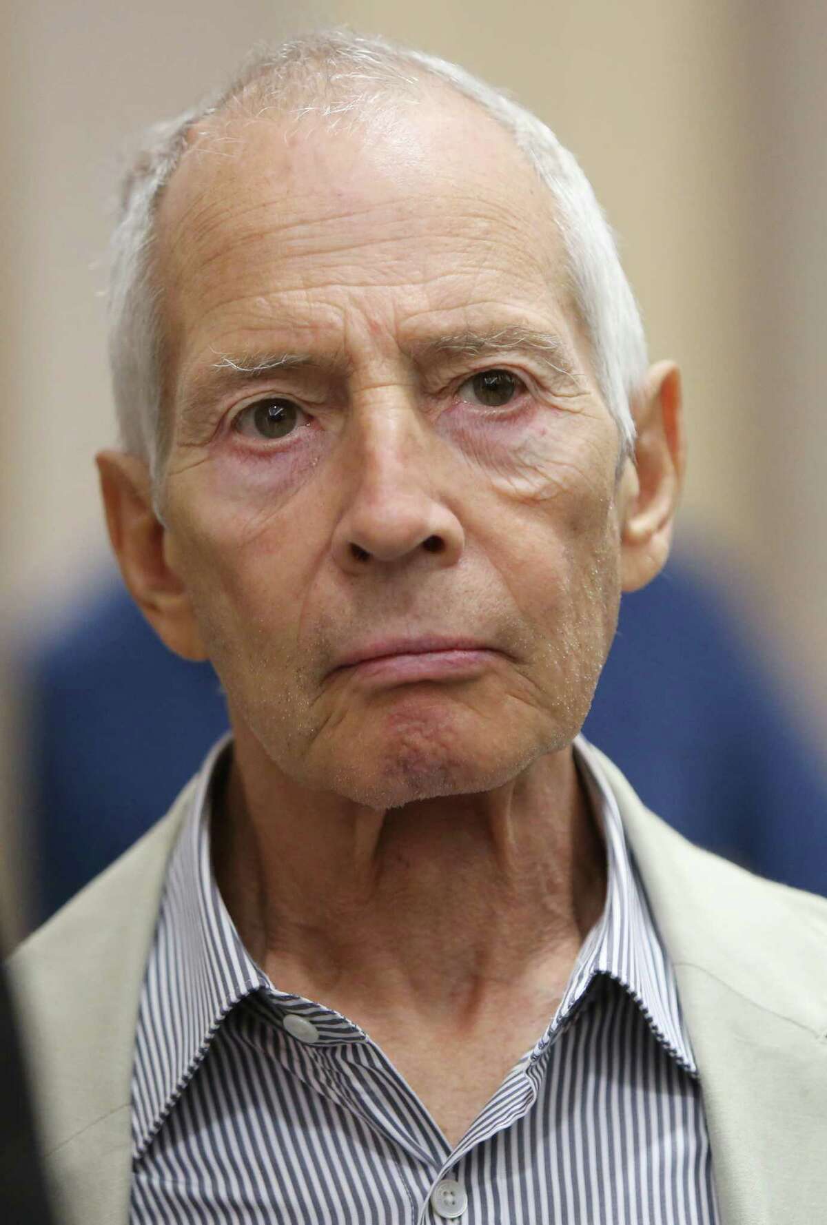 Robert Durst walks out of court after reseting hearing at the Harris County Criminal Justice Center on Friday, Aug. 15, 2014, in Houston. Robert Durst is accused of exposing himself and urinating inside a CVS store. According to police, Durst purchased a prescription at the CVS pharmacy, without any apparent provocation, Durst allegedly began urinating on the cash register, drenching a candy display. ( Mayra Beltran / Houston Chronicle )