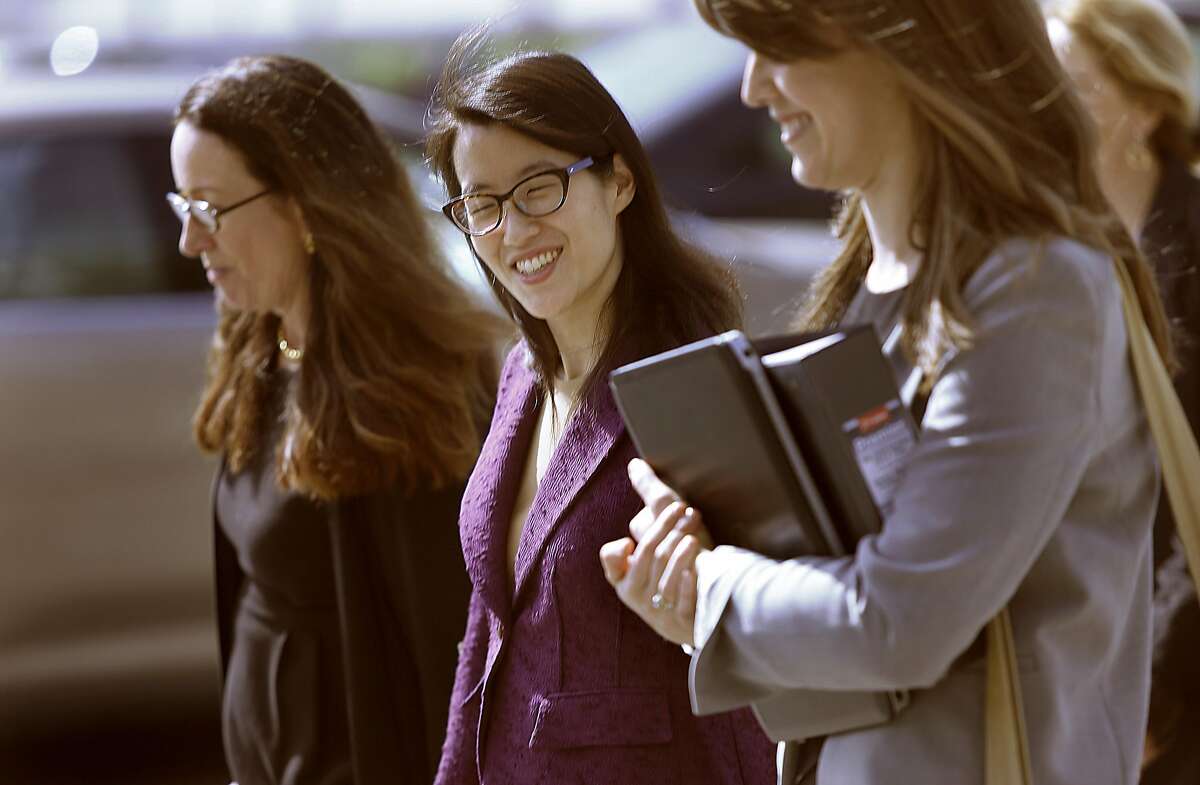 Ellen Pao (middle) takes a break with her attorneys after testifying in her suit against Kleiner Perkins in San Francisco, California on Monday, March 9, 2015.