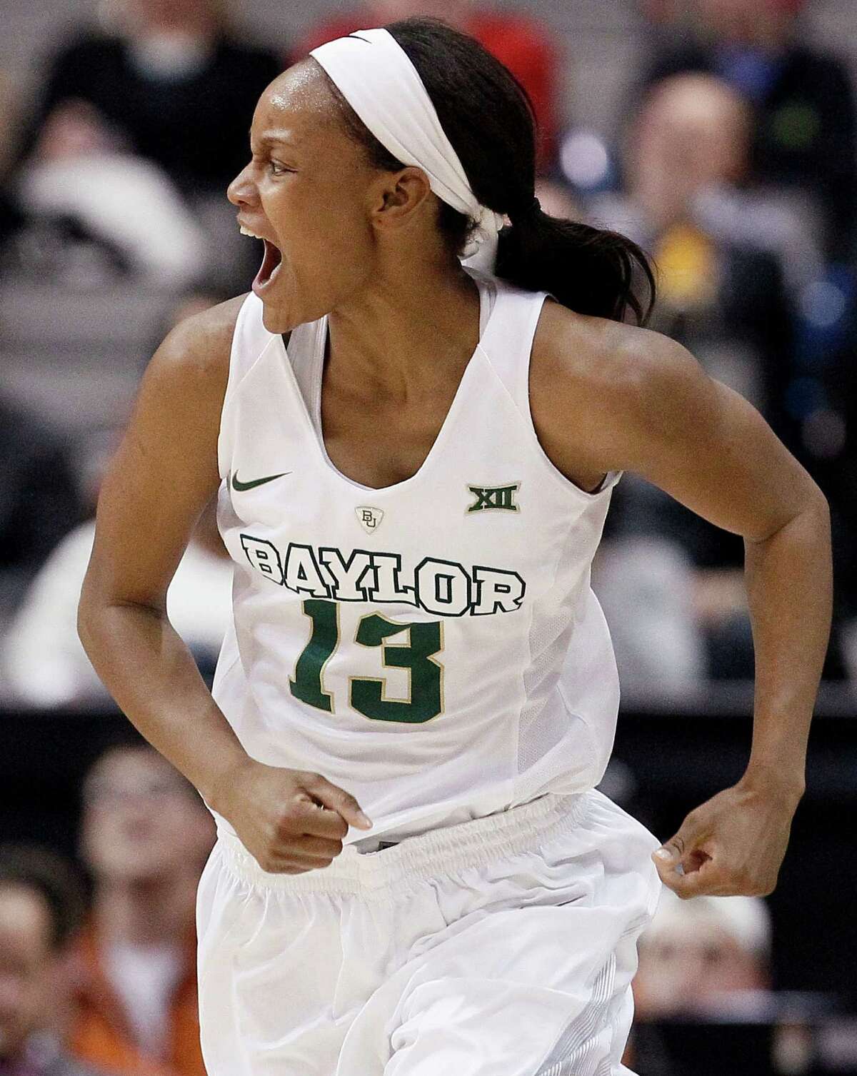Nina Davis celebrates a basket that helped Baylor get off to a fast start Monday in its victory over Texas. Davis had 14 points in the first half as Baylor built a five-point halftime lead.