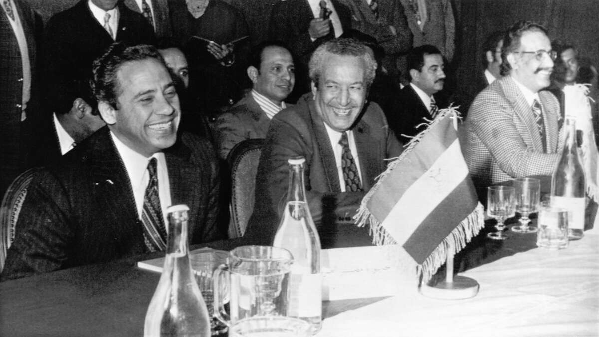 Tripoli, LIBYA, Mar. 14, 1974 -- (L-R) Egyptian oil minister Ahmed Hallal, Libyan oil minister Ezzedin Mabrouk and Kuwait finance minister Abdul Rhaman Al-Atiki share a laugh during oil meeting in Tripoli, Libya. (AP Wirephoto) (sp stf Saris) 1974