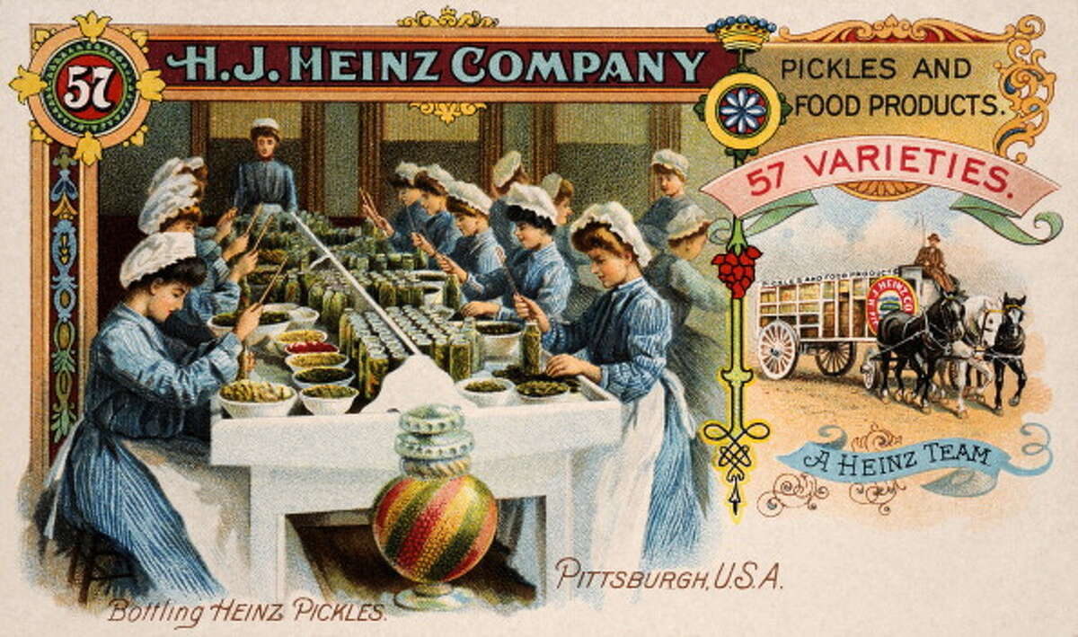 A vintage colour illustration featuring an assembly line of ladies bottling Heinz pickles, advertising H J Heinz Company 57 Varieties, circa 1900.
