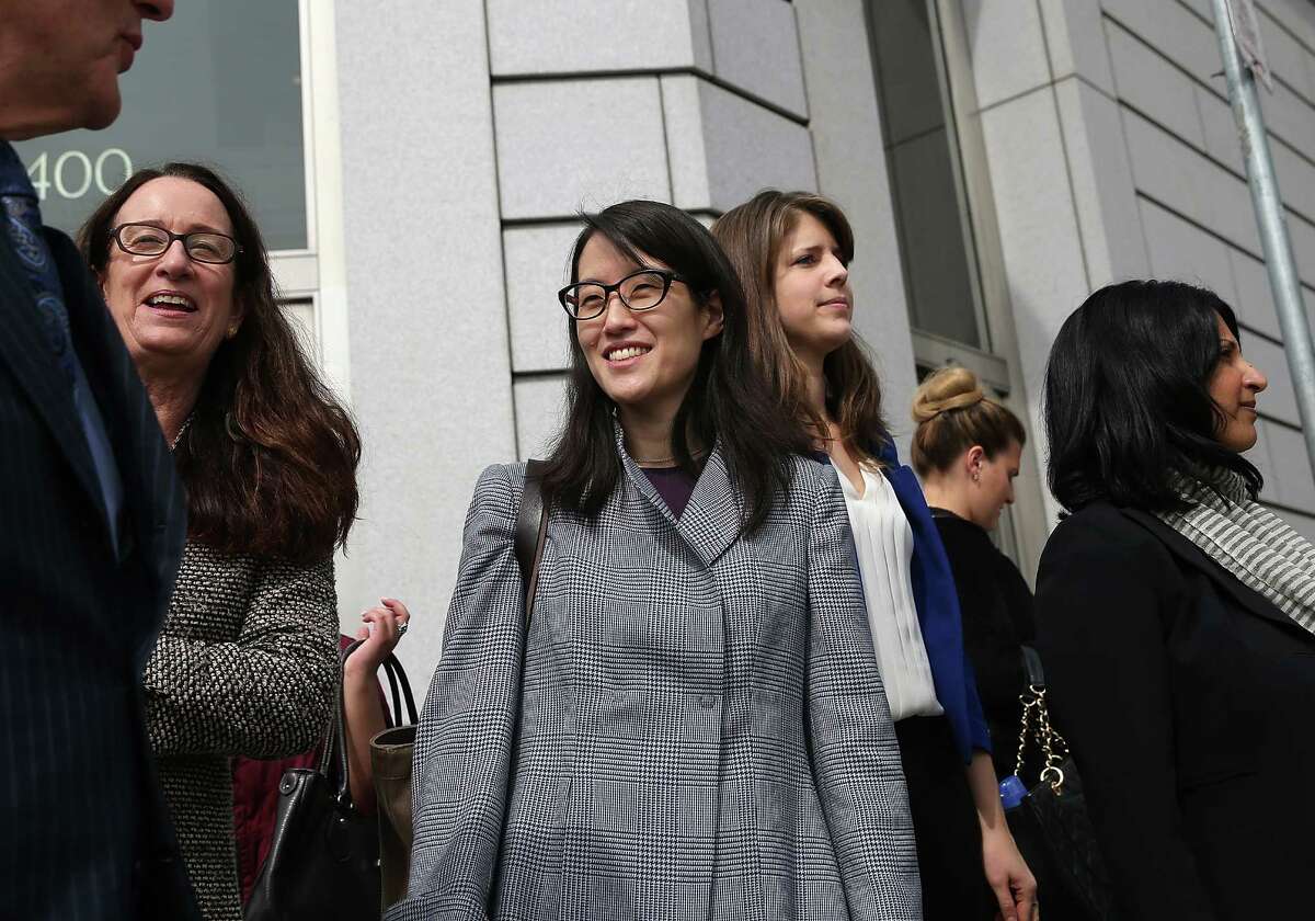 SAN FRANCISCO, CA - MARCH 10: Ellen Pao (C) leaves the California Superior Court Civic Center Courthouse during a lunch break from her trial on March 10, 2015 in San Francisco, California. Reddit interim CEO Ellen Pao is suing her former employer, Silicon Valley venture capital firm Kleiner Perkins Caulfield and Byers, for $16 million alleging she was sexually harassed by male officials. (Photo by Justin Sullivan/Getty Images)