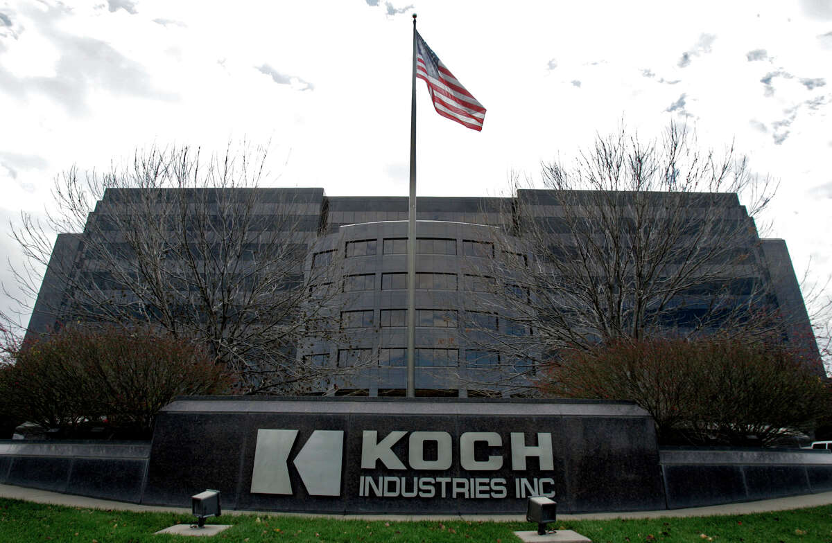 Koch Industries is based in Wichita, Kan. Three Democrats are asking companies if they backed research into global warming.﻿