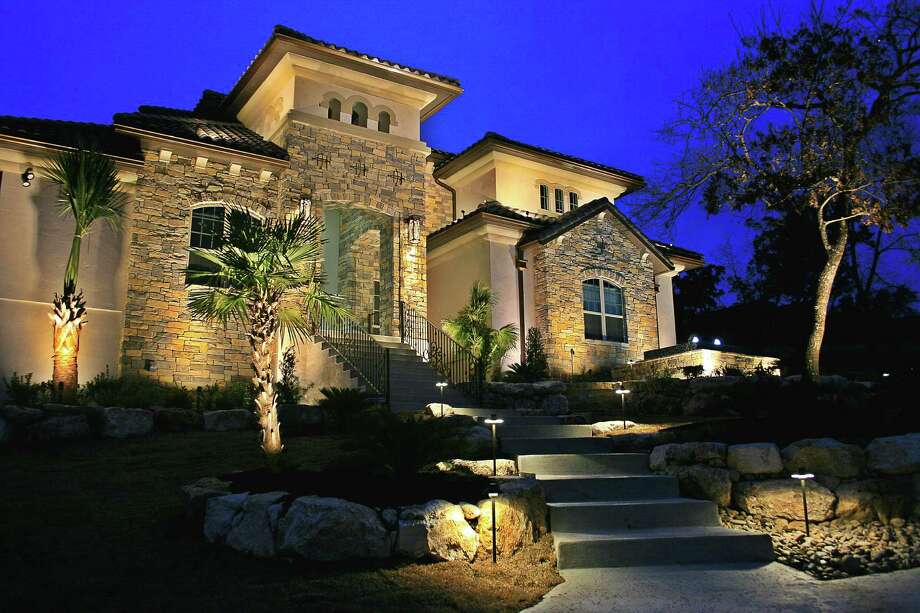 Light Up The Night San Antonio Express News Lights Wash The Facade Of A House Highlighting Its Architectural Detail In Design By