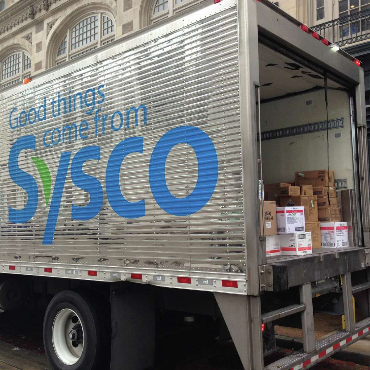 A Sysco truck makes a delivery in downtown Houston.