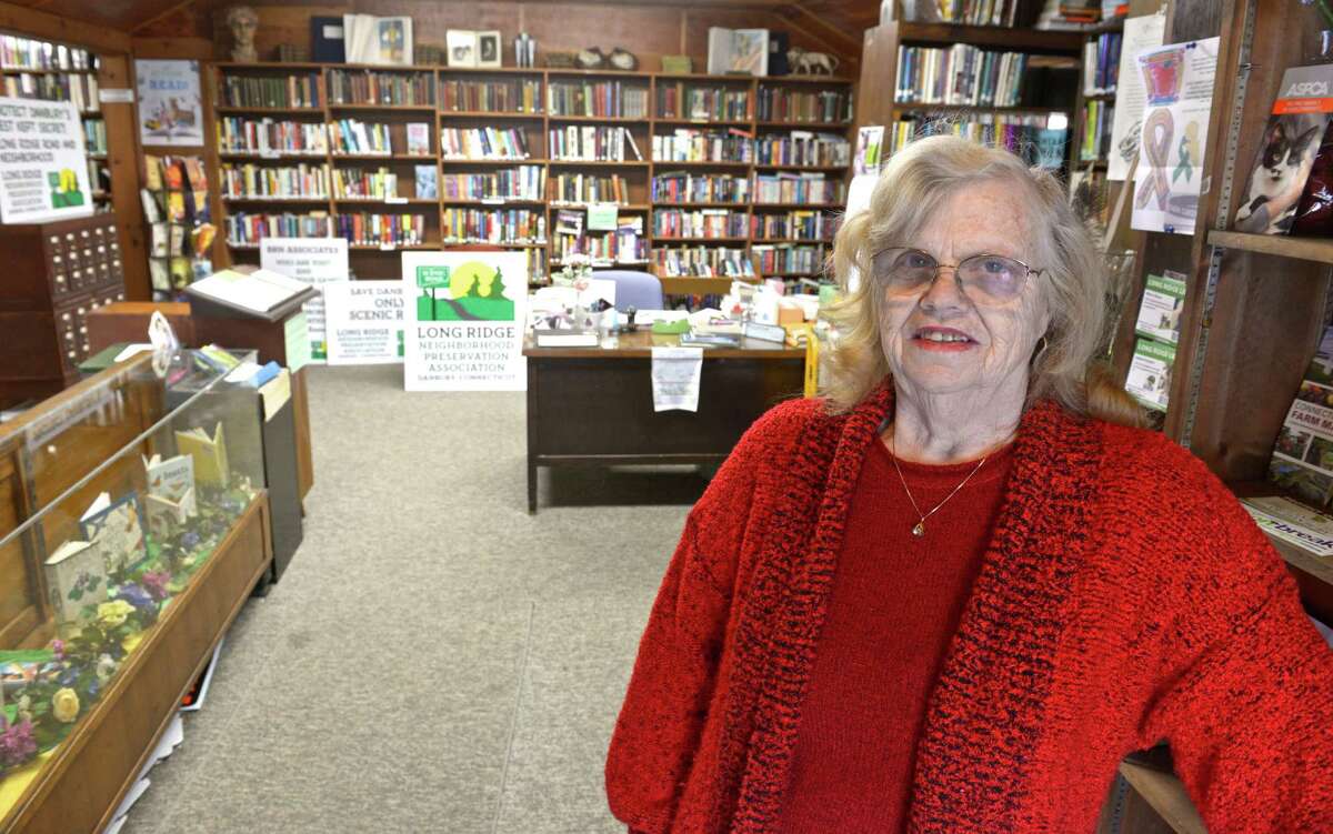 Barbara Fulton, a librarian at the Long Ridge Library in Danbury, is part of a neighborhood association that opposes the plan by Writer's Institute of selling an 18-acre property to an unaffiliated church group. They believe that the church would represent much more traffic and disruption than the current use. Wednesday, March 11, 2015, in Danbury, Conn.