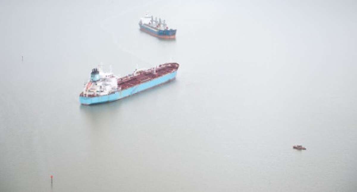 The chemical tanker Carla Maersk and the bulk carrier Conti Peridot off Morgan's Point, Texas, March 10, 2015, after being involved in a collision March 9, 2015.