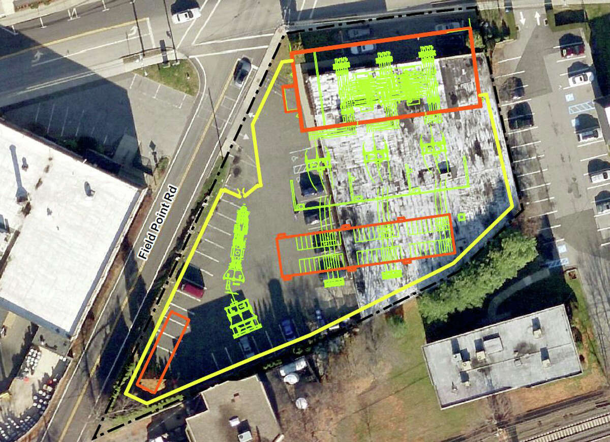 This rendering shows plans for a new substation at 290 Railroad Ave. The black line represents the property boundary; yellow marks proposed fencing; red, buildings; and green, proposed equipment layout.