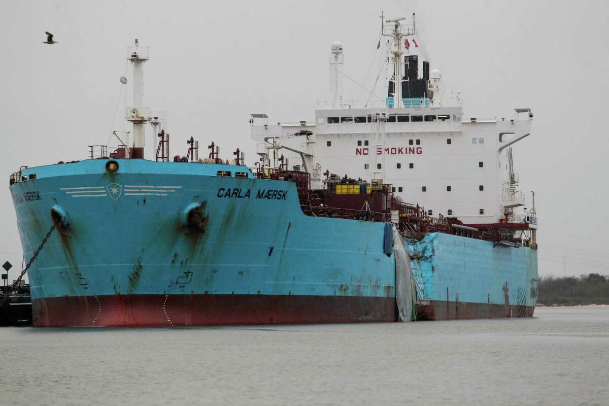 The damaged hull of the Carla Maersk a chemical tanker Wednesday March 11, 2015 in the Houston Ship Channel. The Carla Maersk and the Conti Peridot, a Liberian bulk carrier collided Monday March 9, 2015 in the Houston Ship Channel. The Carla Maersk was carrying 216,000 barrels of gasoline additive which began to spill into the water after the collision.