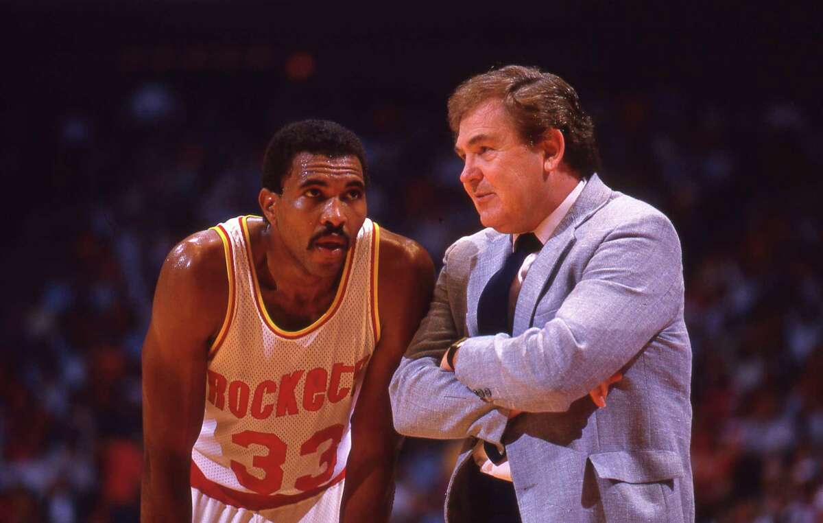 Houston Rockets guard Robert Reid, a former Clemens star, gets some instructions from head coach Bill Fitch during a playoff game against the Boston Celtics at the Summit in Houston in 1986.