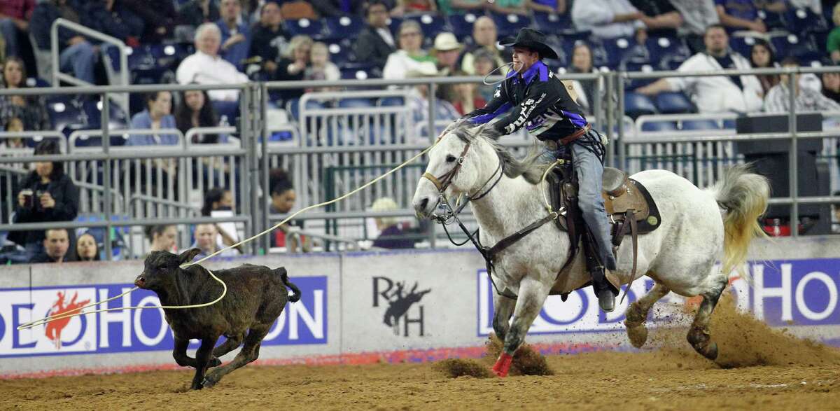 Josh Peek prepares to rope a calf in the tie-down roping competition during the Houston Livestock Show and Rodeo at NRG Stadium, Wednesday, March 11, 2015, in Houston. Peek won the series.