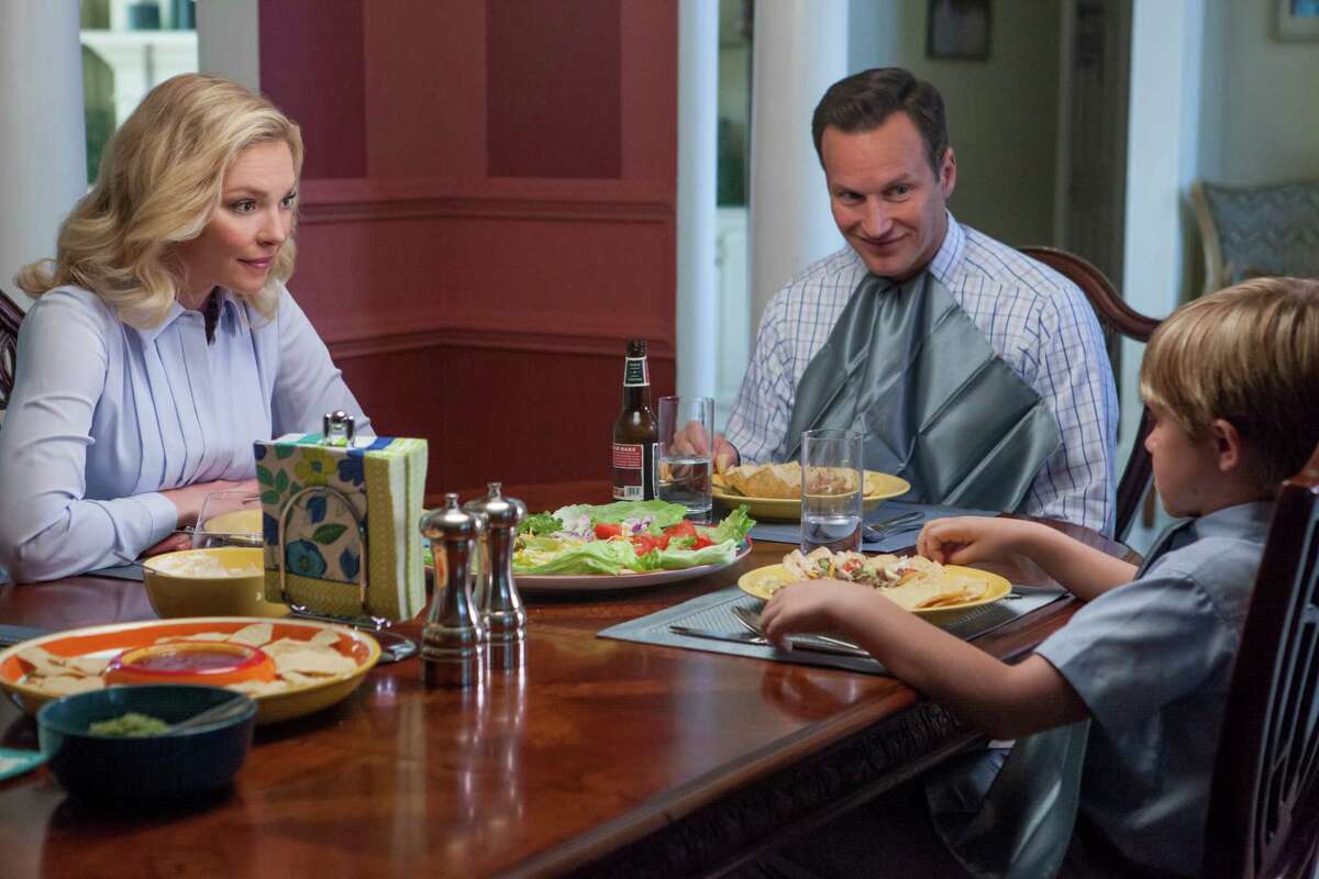 Don Champagne (Patrick Wilson) seems to have it all until his wife Mona (Katherine Heigl) learns of his affair with a coworker in âHome Sweet Hell.â Aiden Flowers is their son, Andrew Champagne.