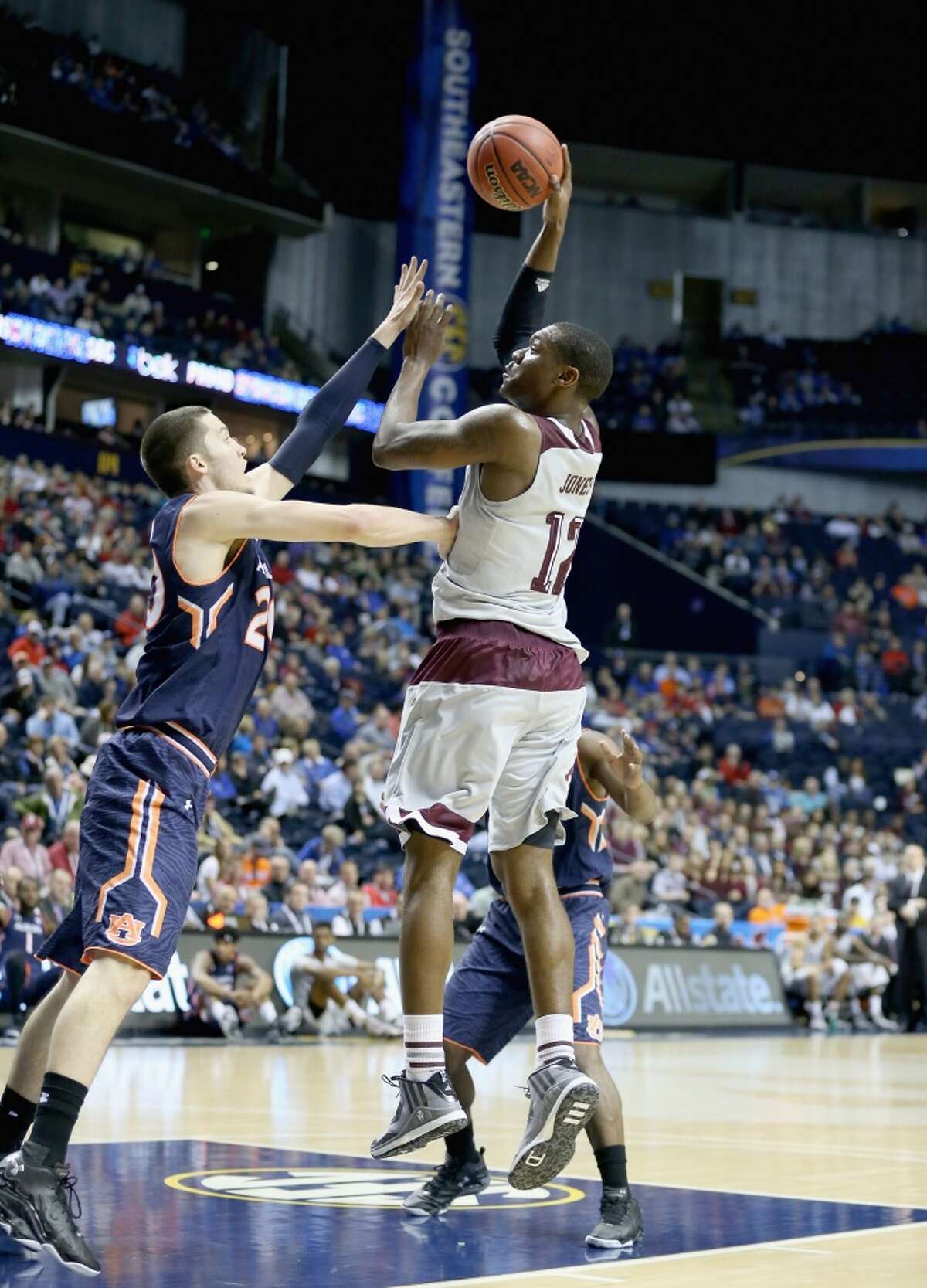 NASHVILLE, TN - MARCH 12: Jalen Jones #12 of the Texas A&M Aggies shoots the ball against the Auburn Tigers during the second round game of the SEC Basketball Tournament at Bridgestone Arena on March 12, 2015 in Nashville, Tennessee. (Photo by Andy Lyons/Getty Images)