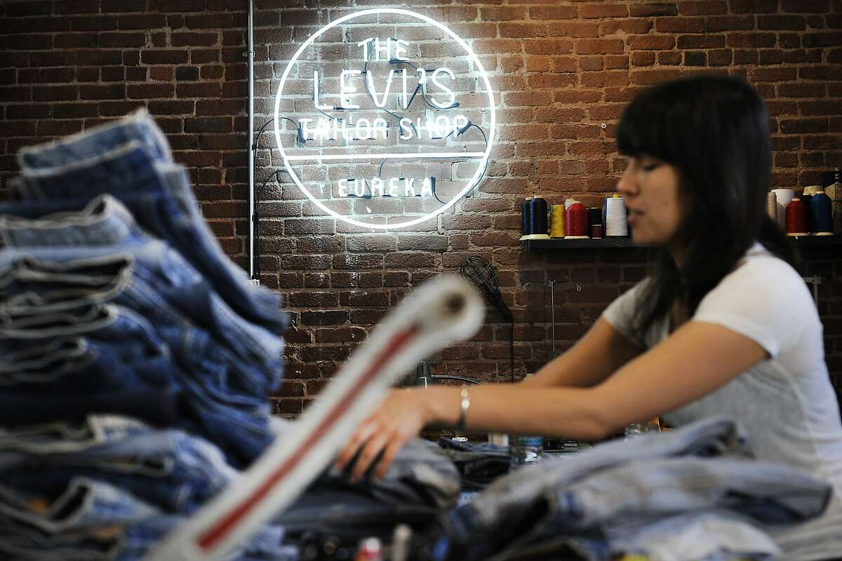 Master tailor Laura Sato works with vintage jeans in the Taylor Shop at Levi Strauss's Eureka Innovation Lab in San Francisco, CA, on Friday, March 6, 2015. Michael Kobori is spearheading a drive for the apparel maker to generate 100 percent of its annual revenue from products that leave no impact on the environment.