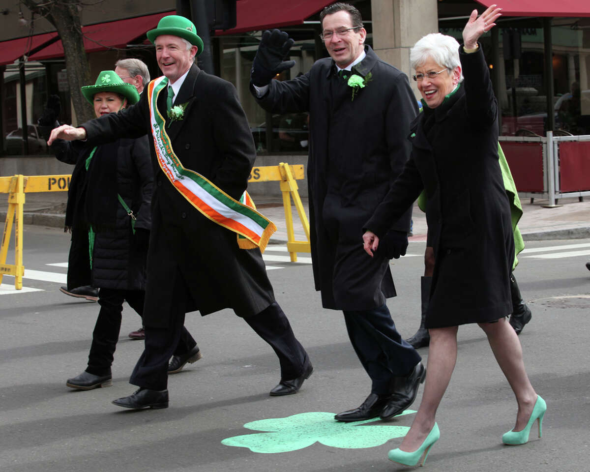 Politicians, from left, Mayor Bill Finch, Gov. Dannel Malloy, and Lt. Governor Nancy Wyman, adorn green in the Greater Bridgeport 32nd St.Patrick's Day Parade in downtown Bridgeport, Conn. on Monday, March 17, 2014.