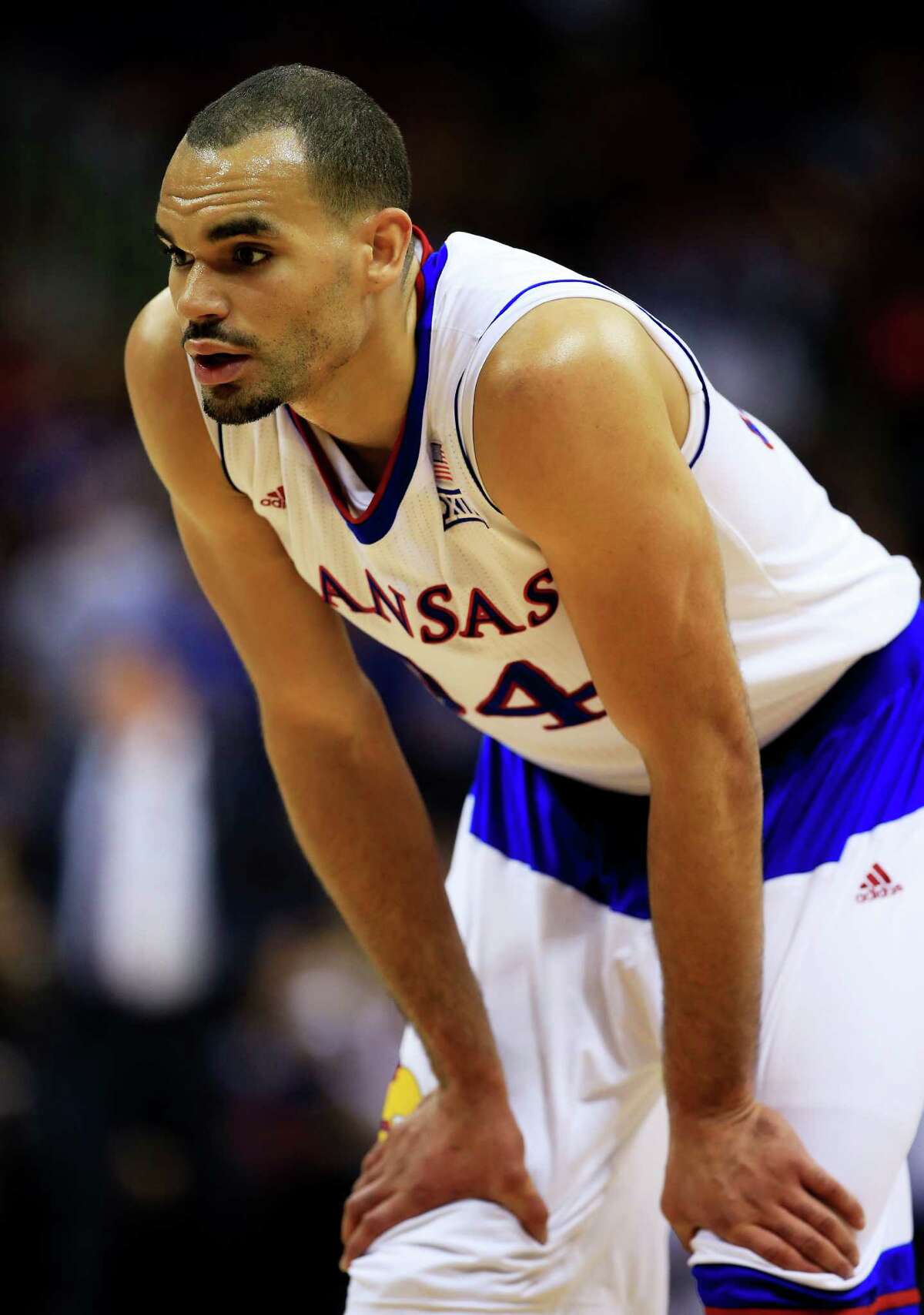 KANSAS CITY, MO - MARCH 13: Perry Ellis #34 of the Kansas Jayhawks looks on against the Baylor Bears in the first half during a semifinal game of the 2015 Big 12 Basketball Tournament at Sprint Center on March 13, 2015 in Kansas City, Missouri. (Photo by Jamie Squire/Getty Images)