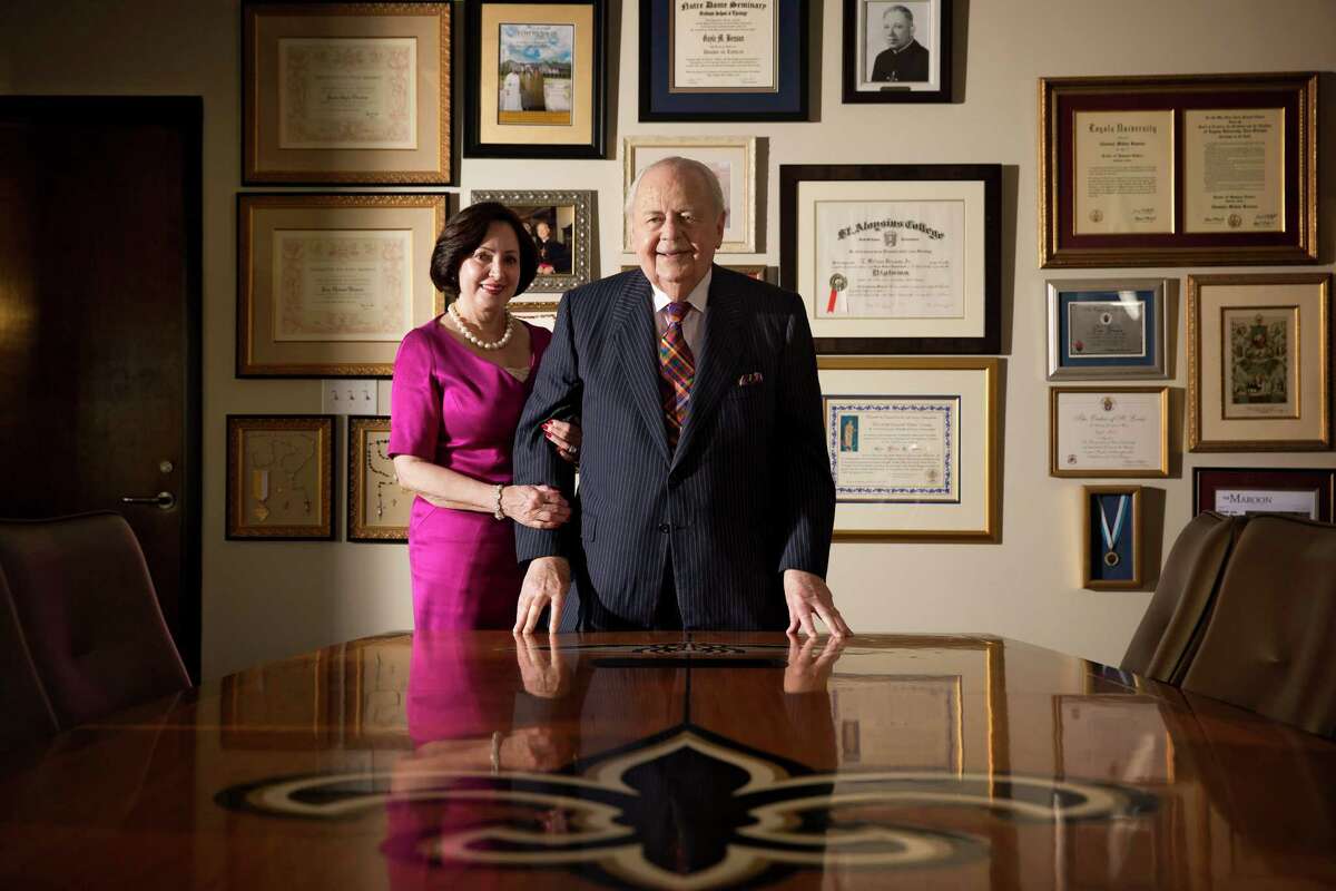 Tom Benson, owner of the NFL's New Orleans Saints and the NBA's New Orleans Pelicans, and his wife, Gayle, are shown at the Saints headquarters. When Benson announced that both the Saints and Pelicans will be passed on to his wife of 10 years, not to his daughter and her two children as had long been assumed, it set off a legal drama over ownership of the teams.