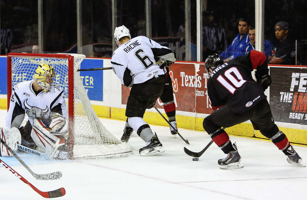 Lake Erie Monsters' Ben Street controls the puck right before scoring in the last seconds of the 1st period of an AHL Hockey game at the AT&T Center in San Antonio, Texas on Friday March 13, 2015. (Josh Huskin/San Antonio Rampage)