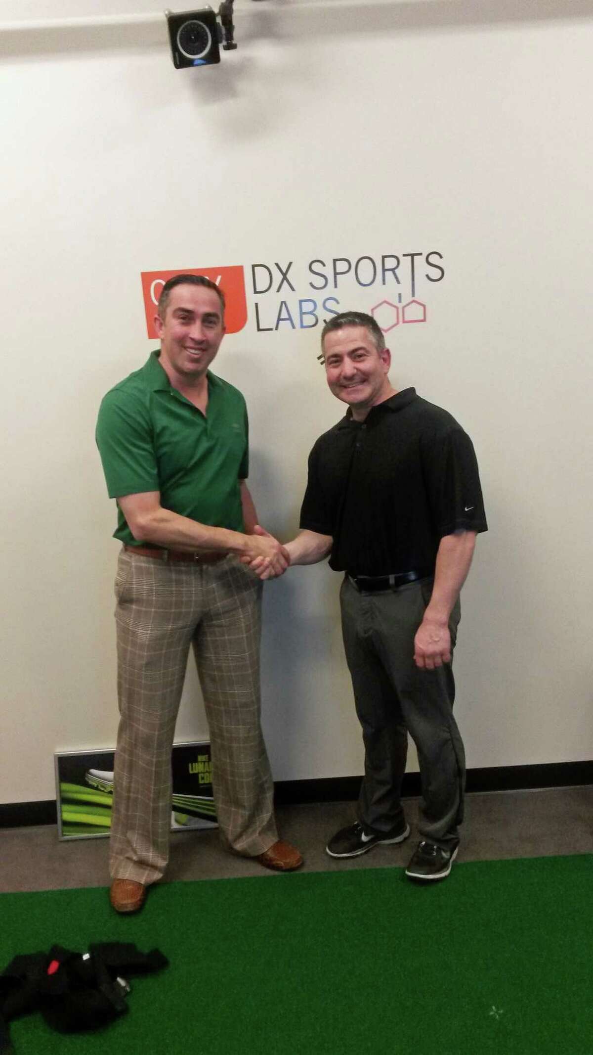 Dancing with the Stars choreographer Christian Perry, left, with Michael Manavian, director of performance at DX Sports Labs at CLAY Health Club + Spa in Port Chester on Friday.