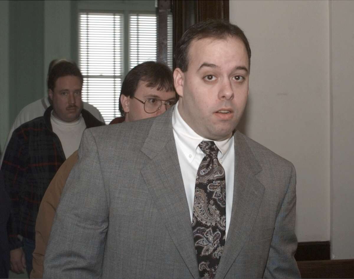 Albany police officer William Bonanni exits Albany County Court in Albany, Monday, March 22, 1999, in Albany, N.Y. (Michael P. Farrell)