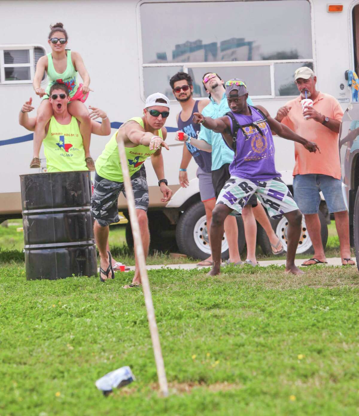 Local spring breakers play drinking games at a RV park behind Dirty Al's Restaurant. 