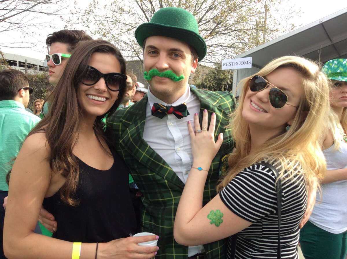 Partygoers celebrate St. Patrick's Day at Pub Fiction on Saturday, March 14 in Houston.