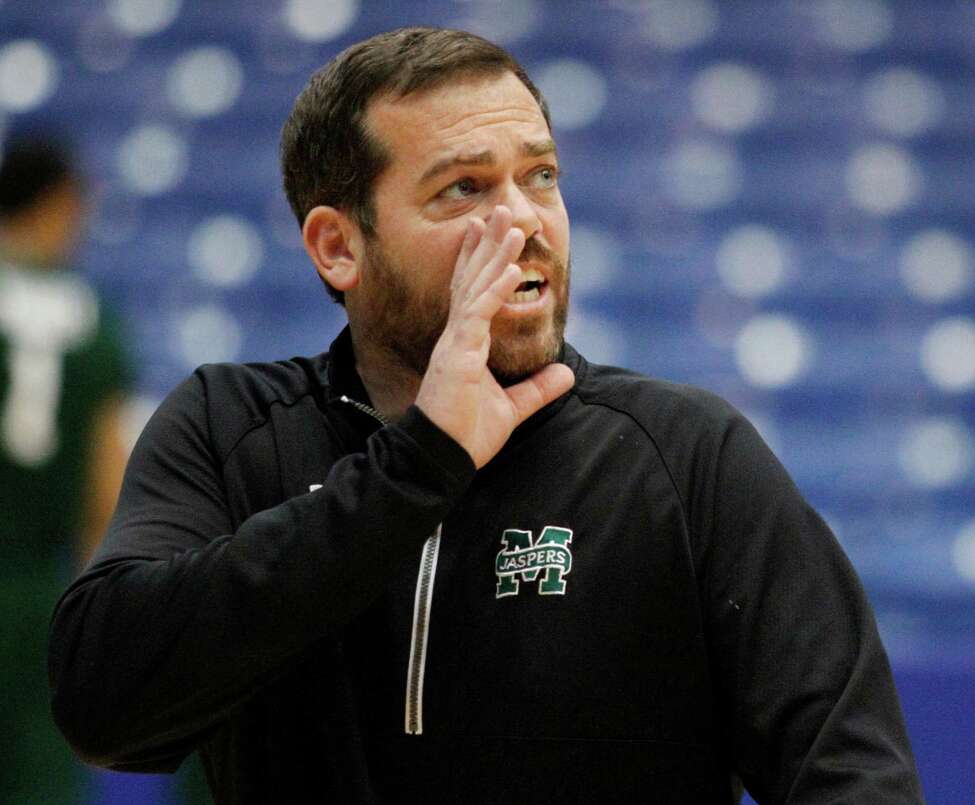 Manhattan head coach Steve Masiello shouts to his team during practice for an NCAA college basketball first round game Monday, March 16, 2015, in Dayton, Ohio. Manhattan plays Hampton in Dayton on Tuesday. (AP Photo/Skip Peterson) ORG XMIT: OHSP108