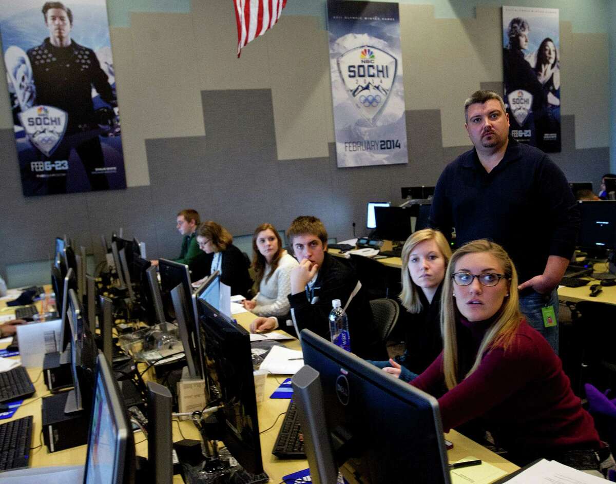 Interns training at NBC Sports in Stamford, Conn., in February 2014 on the eve of the Winter Olympics in Sochi, Russia. Despite significant hiring last year by NBC, Charter Communications and other Stamford employers, the information sector in Connecticut saw an overall drop in jobs.