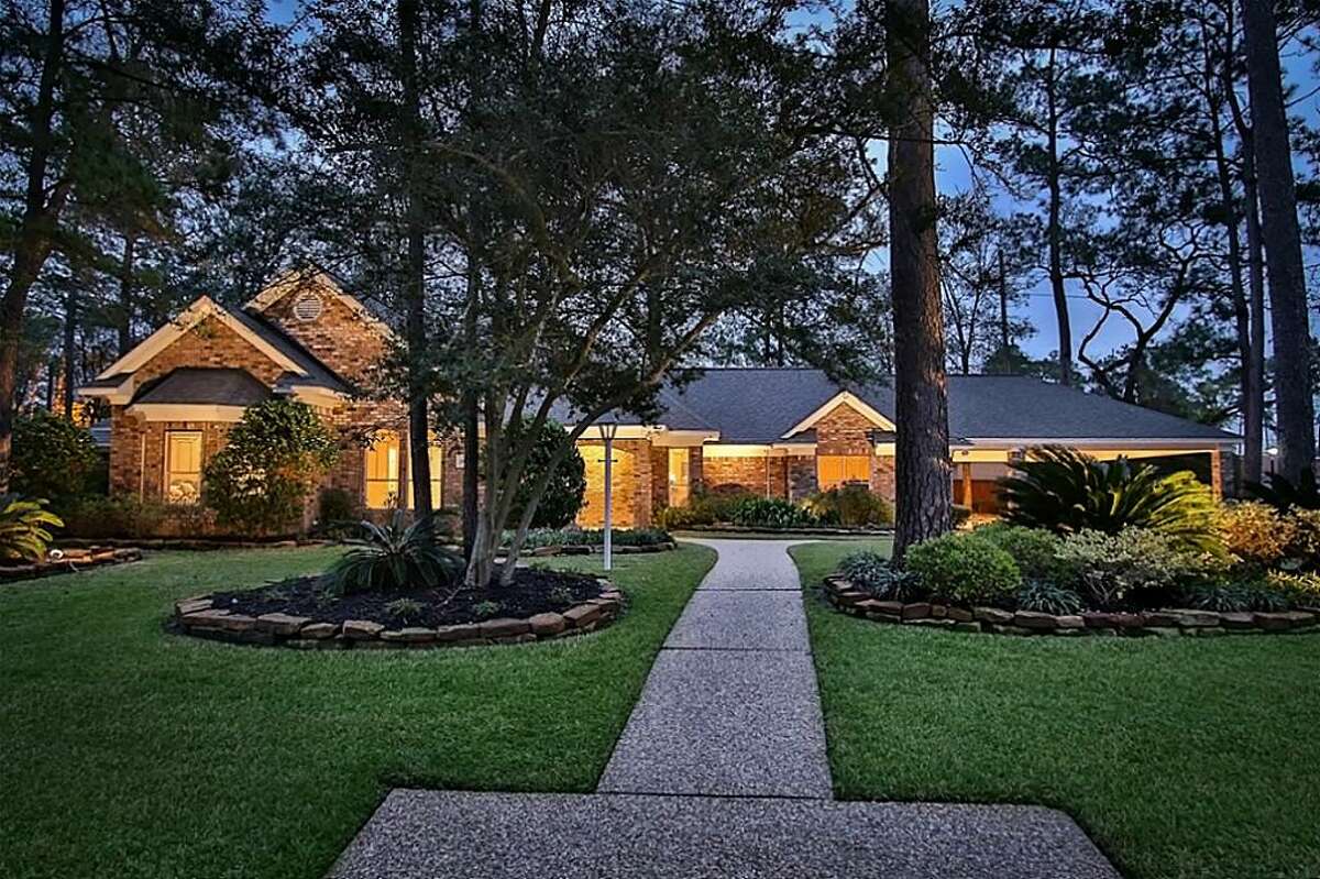 Tomball:Three-bedroom home has wood floors downstairs, a covered patio and a laundry room with wine storage. Garage has been converted to a home gym/media room. 3,132 square feet