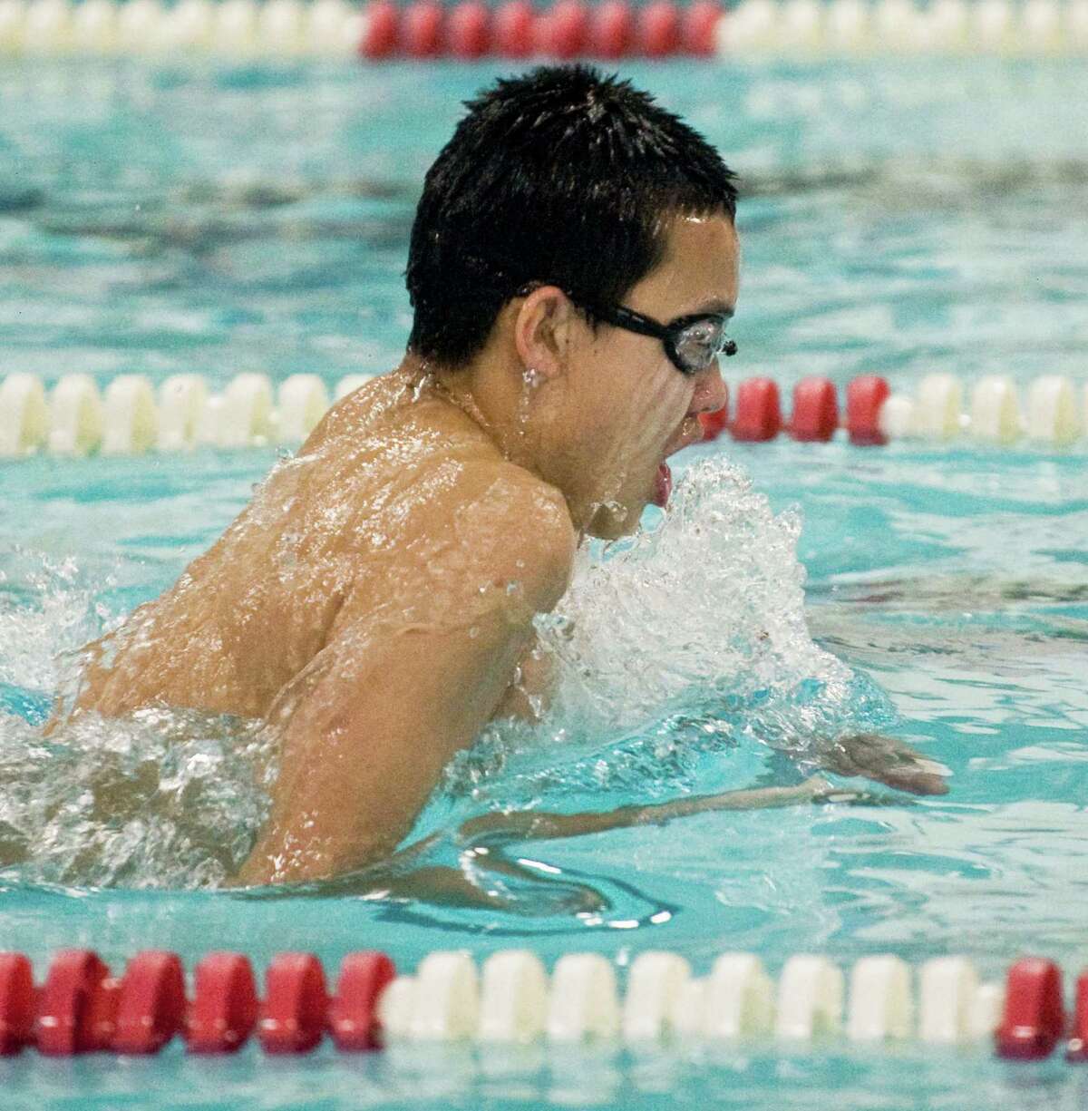 Pomperaug High School's Henry Hu swims the 200 Individual Medley during a meet against Brookfield High School held at Pomperaug. Friday, Jan. 16, 2015