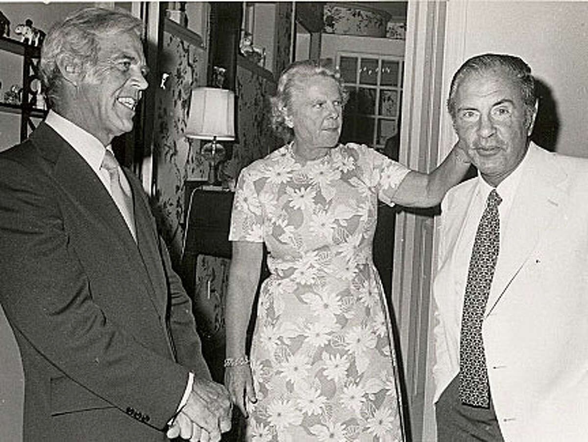 Ruth T. Bedford hosting a YMCA event at her Westport home in the 1960s; with her are Lester Giegerich, left, and Dr. Malcolm Beinfield.