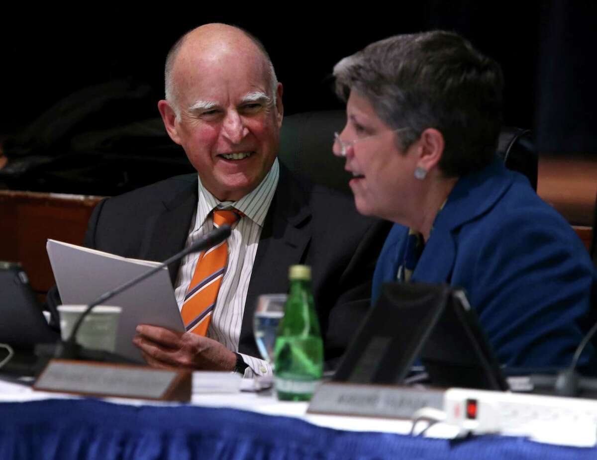 Gov. Jerry Brown and UC President Janet Napolitano smile after updating the University of California Board of Regents on their ongoing discussions about proposed tuition increases in San Francisco, Calif. on Wednesday, March 18, 2015.