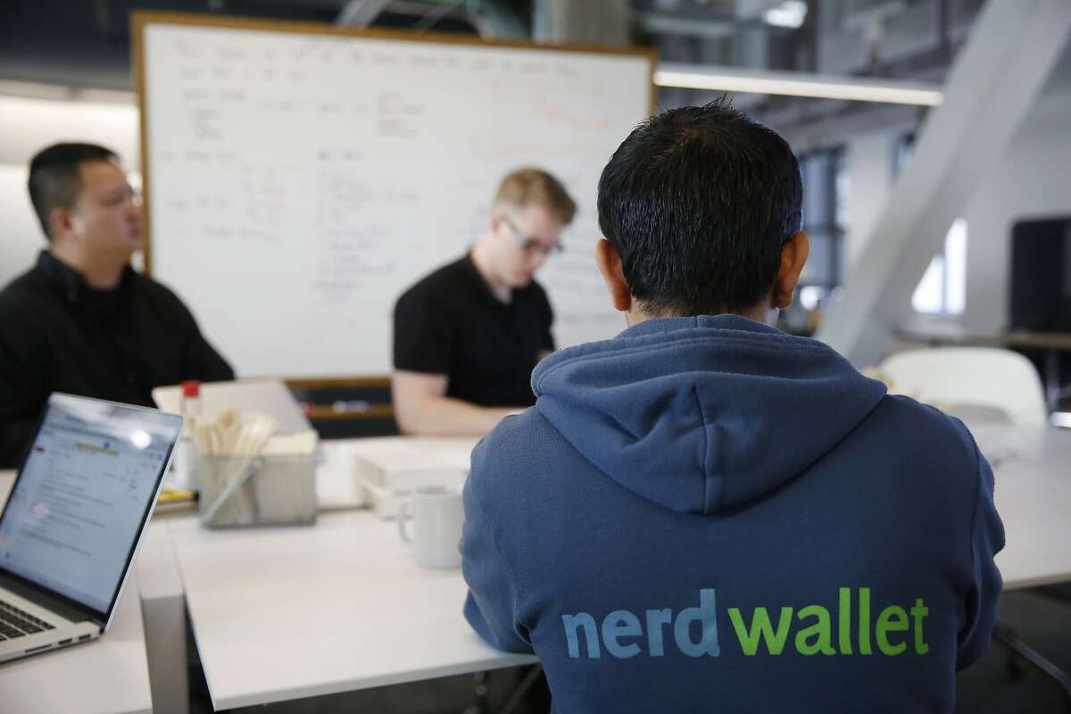 A software engineer at NerdWallet, wears his company sweatshirt during a meeting at the company on Tuesday Feb. 24, 2015 in San Francisco, Calif.