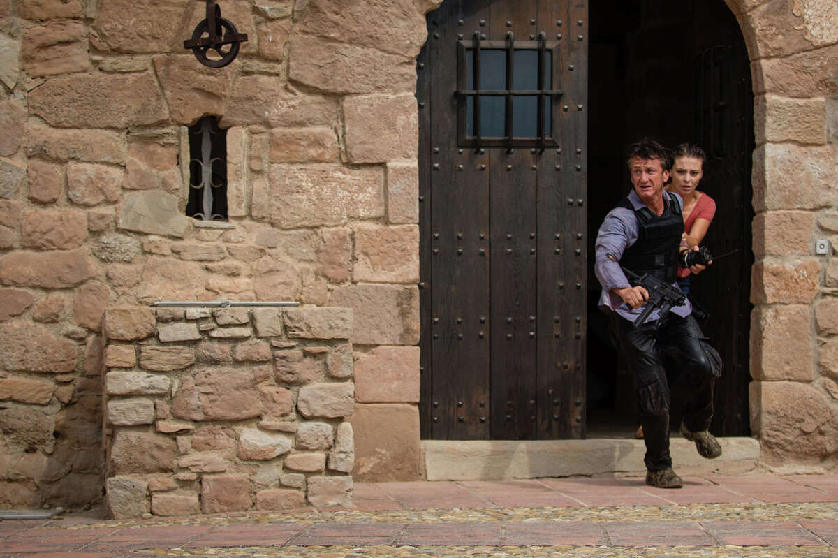 This photo provided by Open Road Films shows, Sean Penn, left, as Jim Terrier, and Jasmine Trinca as Annie, in a scene from the film, "The Gunman," opening in theaters on Friday, March 20, 2015. (AP Photo/Open Road Films, Joe Alblas)