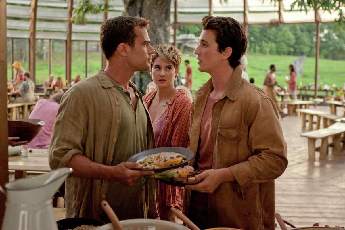 Four (Theo James, left), Tris (Shailene Woodley, center) and Peter (Miles Teller, right) in "The Divergent Series: Insurgent." (Andrew Cooper/Lionsgate/TNS)