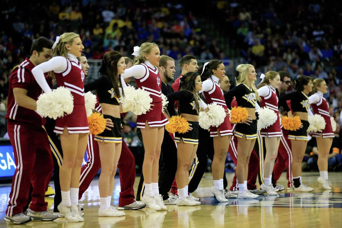 A Louisville cheerleader during the NCAA College Basketball game