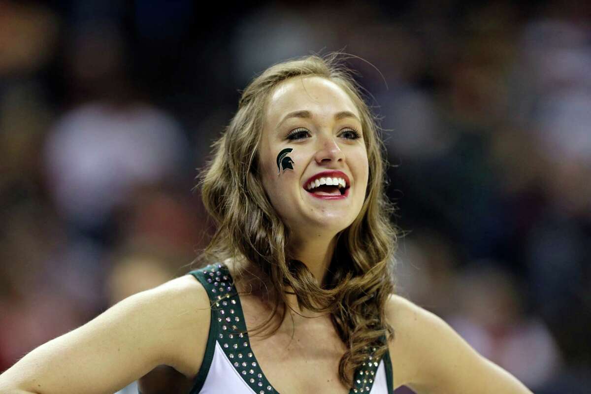 A Louisville cheerleader during the NCAA College Basketball game