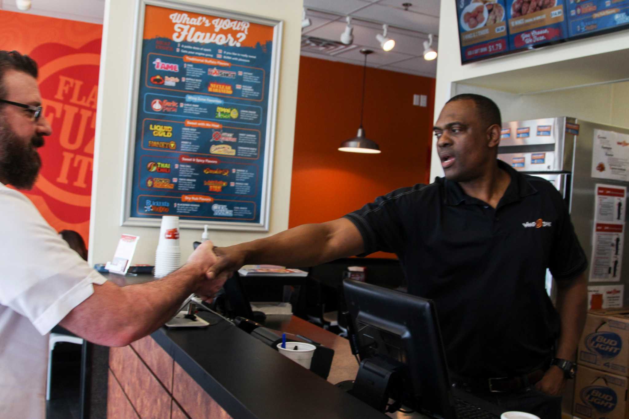 Army officer enlists flavorful small business venture with opening of new  Wing Zone