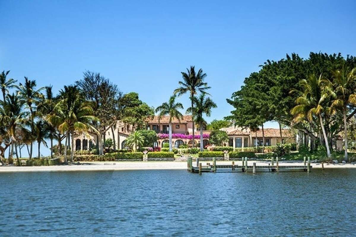 Photos from Zillow.com show the Little Bokeelia Island that is on the market for $24.5 million. The island is located at the tip of Pine Island off Florida’s east coast. The island spans 104 acres, and the mansion atop has four bedrooms with a pool, attached guest house, tennis court and garage for golf carts.