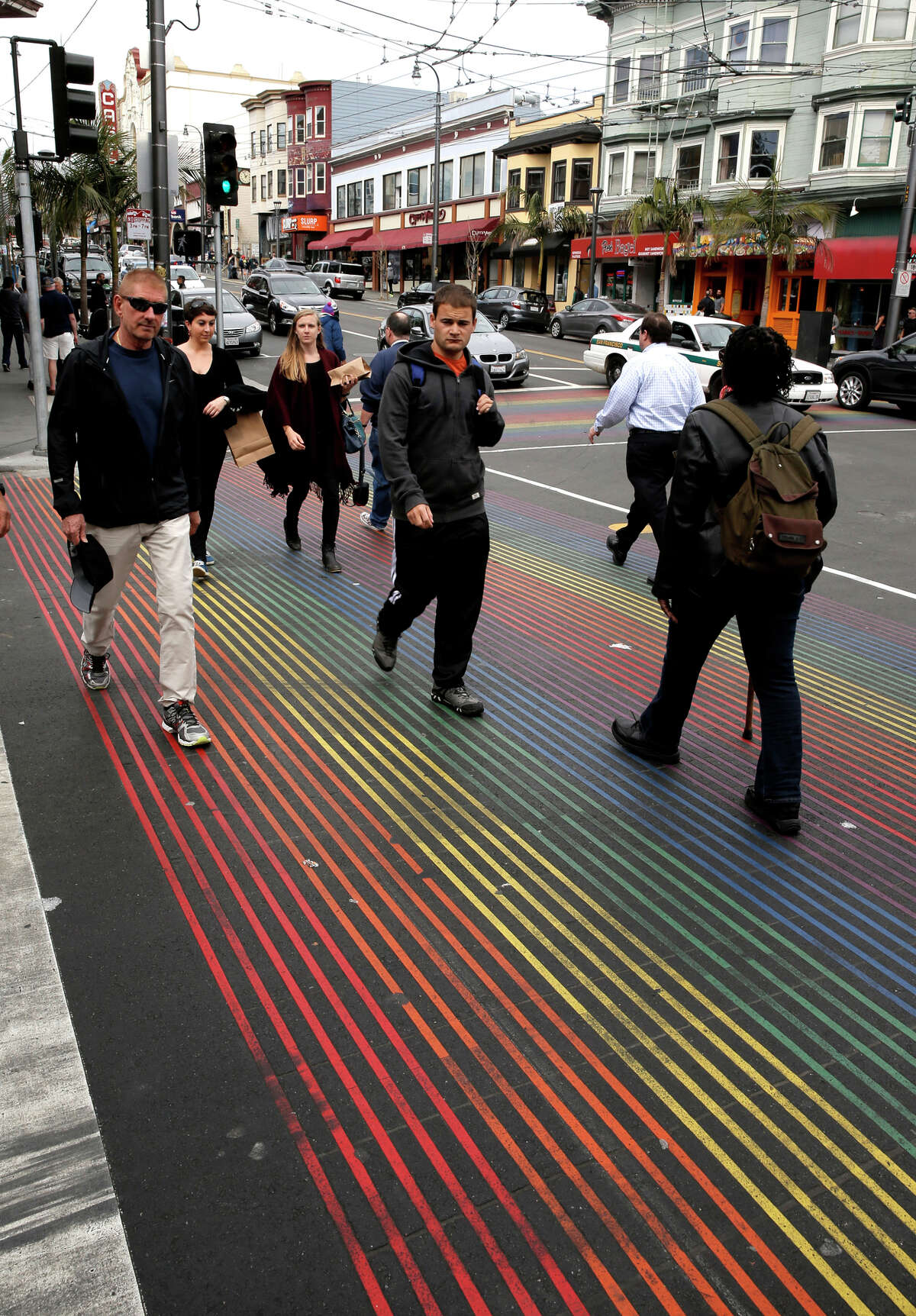 The corner of 18th and Castro streets, with its rainbow-striped crosswalks, remains the epicenter of San Francisco’s highly visible lesbian, gay, bisexual and transgender community.