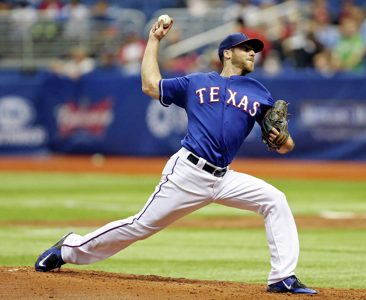 Texas Rangers' Anthony Bass pitches against the Los Angeles Dodgers during the Big League Weekend spring exhibition baseball game held Friday March 20, 2015 at the Alamodome.