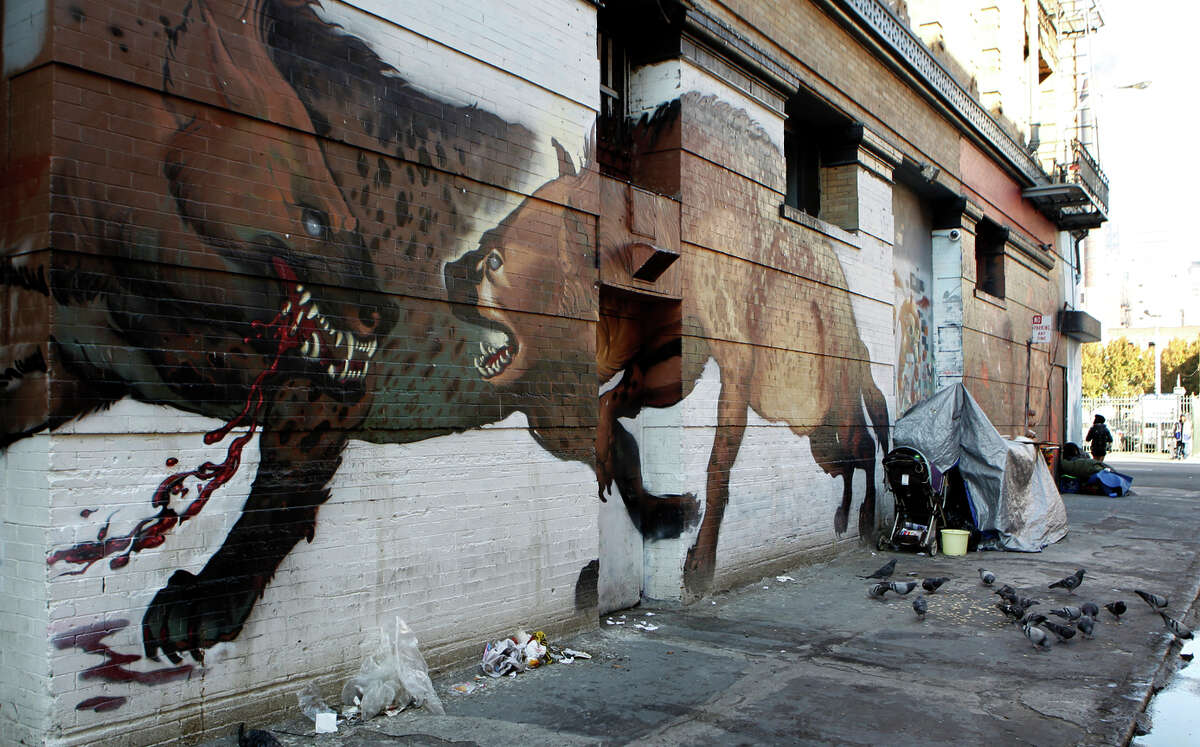 Large murals decorate a building at Sixth and Jessie streets in San Francisco, Calif. on Wednesday, Jan. 16, 2013.