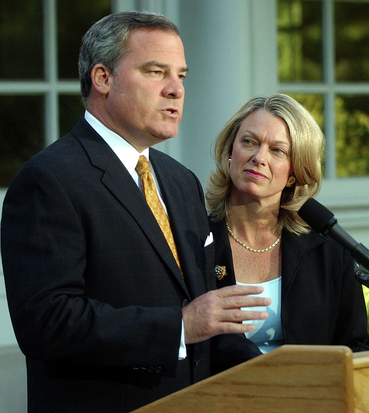 Connecticut Gov. John G. Rowland, with his wife Patty beside him, announces his resignation from office at the governor's mansion in Hartford, Conn., Monday, June 21, 2004. Rowland said he will resign effective at noon, July 1, 2004.